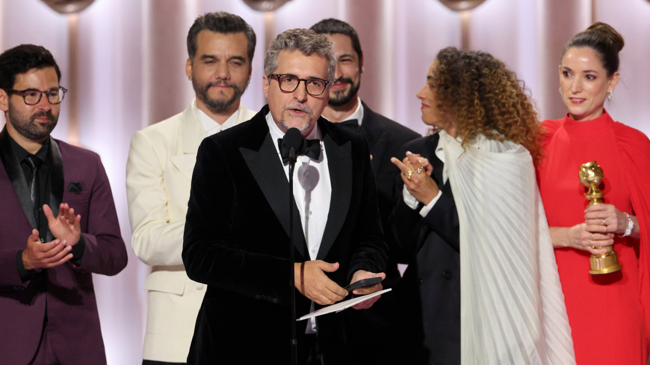 (L to R) Fred Burle, Wagner Moura, Kleber Mendonça Filho, Gabriel Leone, Alice Carvalho and Emilie Lesclaux accept the Best Motion Picture – Non-English Language Award for 'The Secret Agent' onstage during the 83rd Annual Golden Globes®, airing live from the Beverly Hilton in Beverly Hills, California on Sunday, January 11, 2026 at 8 PM ET/5 PM PT, on CBS and streaming on Paramount+. Photo: Kevork Djansezian/CBS ©2026 CBS Broadcasting, Inc. All Rights Reserved.