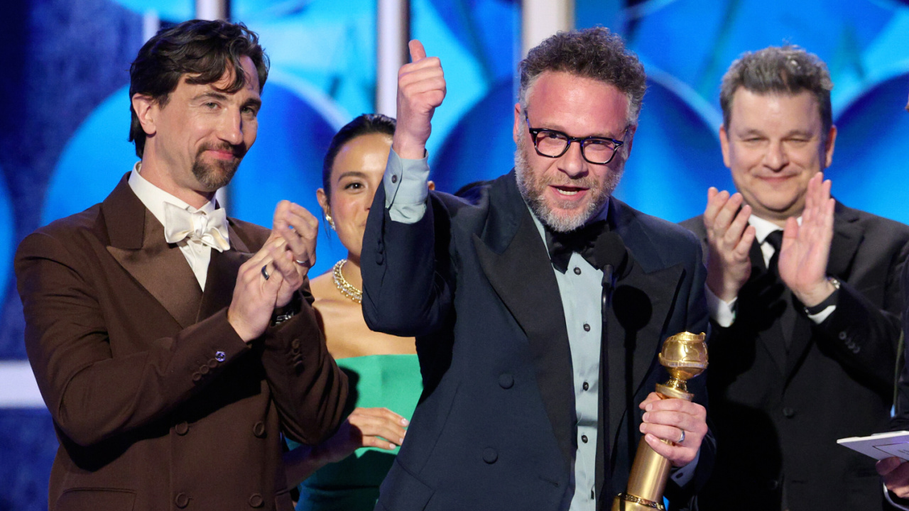 (L to R) James Weaver, Chase Sui Wonders, Seth Rogen and Alex Gregory accept the Best TV Series ñ Musical or Comedy Award for 'The Studio' onstage during the 83rd Annual Golden Globes®, airing live from the Beverly Hilton in Beverly Hills, California on Sunday, January 11, 2026 at 8 PM ET/5 PM PT, on CBS and streaming on Paramount+. Photo: Kevork Djansezian/CBS ©2026 CBS Broadcasting, Inc. All Rights Reserved.