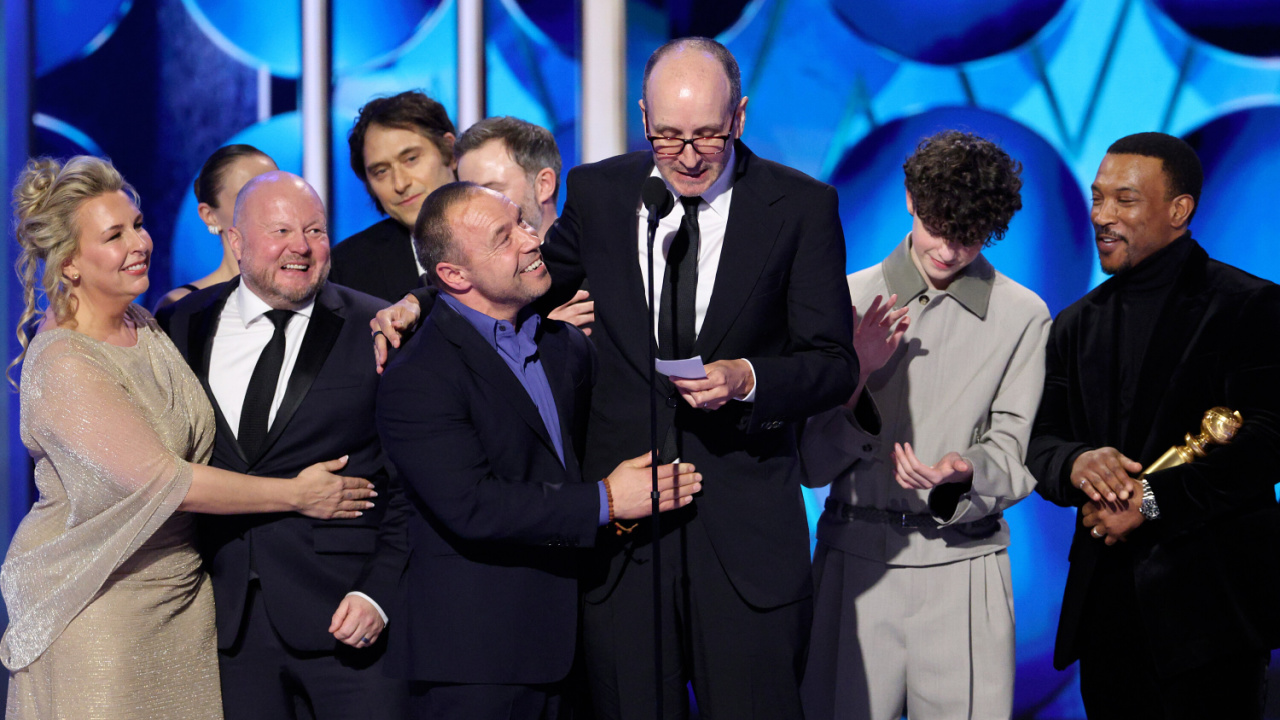 (L to R) Hannah Walters, Mark Herbert, Jeremy Kleiner, Stephen Graham, Jack Thorne, Reece Feldman and Ashley Walters accept the Best Limited Series, Anthology Series, or Motion Picture Made for Television Award for 'Adolescence' onstage during the 83rd Annual Golden Globes®, airing live from the Beverly Hilton in Beverly Hills, California on Sunday, January 11, 2026 at 8 PM ET/5 PM PT, on CBS and streaming on Paramount+. Photo: Kevork Djansezian/CBS ©2026 CBS Broadcasting, Inc. All Rights Reserved.