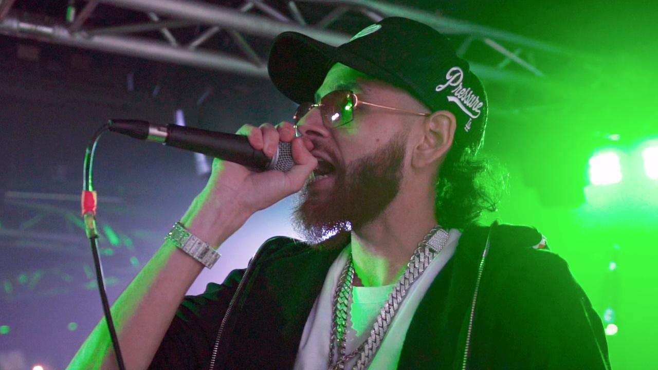 Chito (Jay Dee) performing on stage in 'Clika'. Photo: Sony Pictures. © 2025 CTMG, Inc. All Rights Reserved.