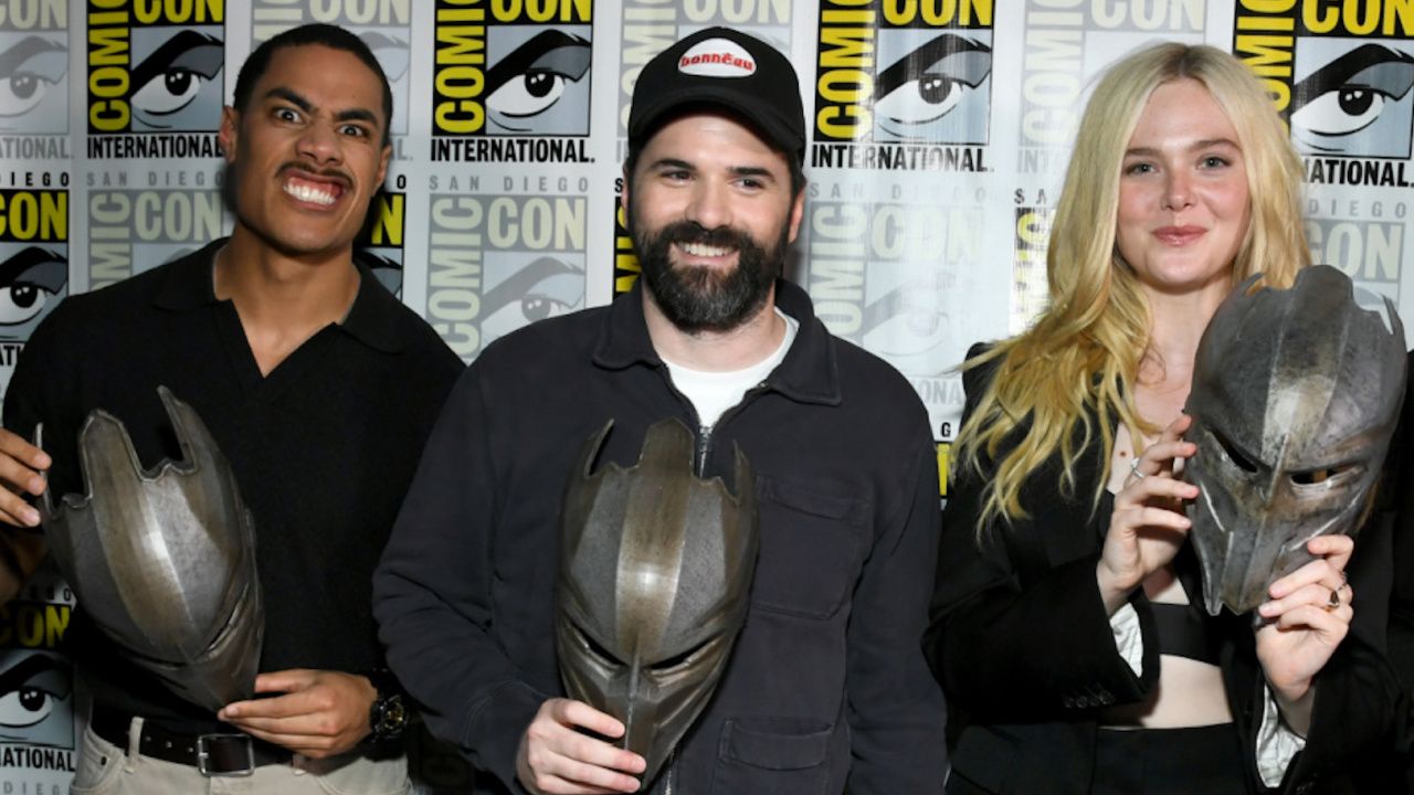 (L to R) Dimitrius Schuster-Koloamatangi, director Dan Trachtenberg, and Elle Fanning at San Diego Comic-Con 2025 Hall H panel for 'Predator: Badlands'. Photo: Disney.