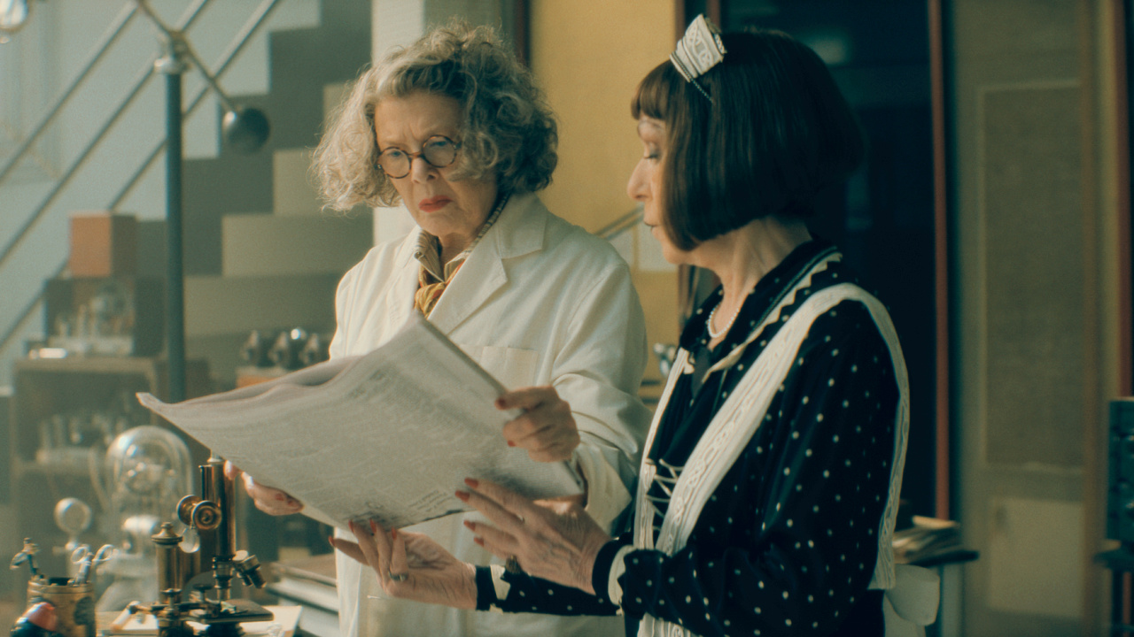 (L to R) Annette Bening as Dr. Euphronious and Jeannie Berlin as Greta in Warner Bros. Pictures 'The Bride!', a Warner Bros. Pictures release. Photo Credit: Courtesy of Warner Bros. Pictures. Copyright: © 2026 Warner Bros. Entertainment Inc. All rights reserved.