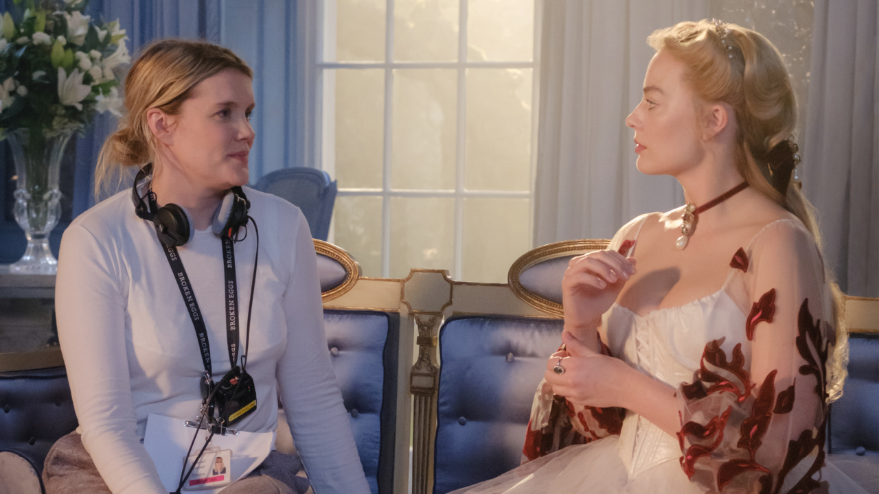 (L to R) Director, Writer, Producer Emerald Fennell and Actor, Producer Margot Robbie on the set of 'Wuthering Heights', a Warner Bros. Pictures Release. Photo Credit: Photo by Jaap Buitendijk. Copyright: © 2026 Warner Bros. Ent. All Rights Reserved.