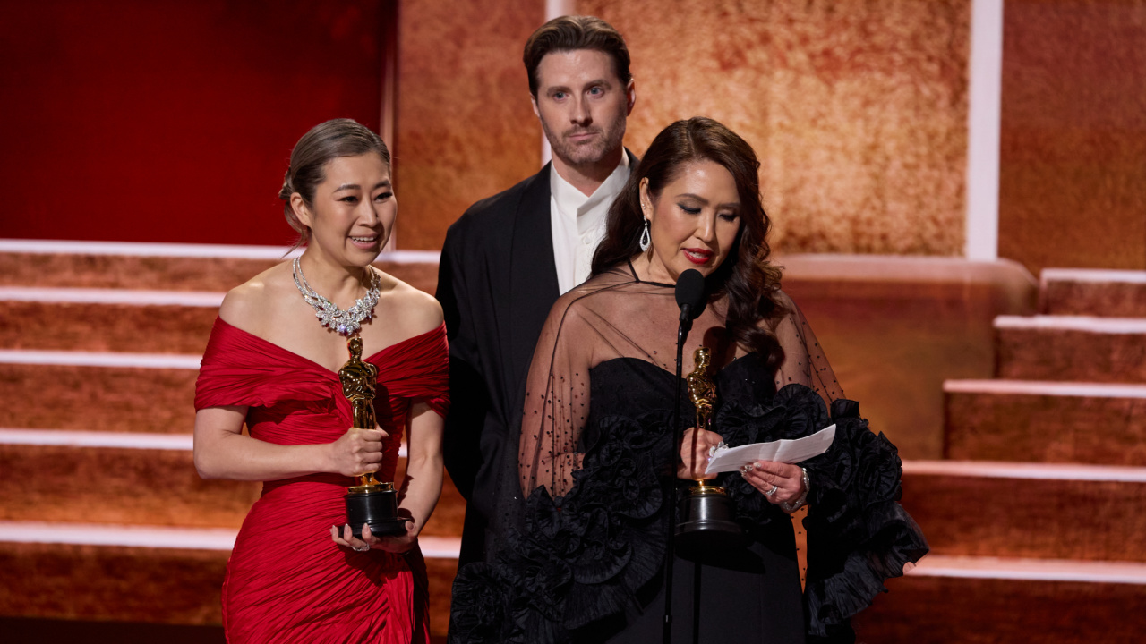 (L to R) Maggie Kang, Chris Appelhans and Michelle Wong accept the Oscar® for Animated Feature Film during the 98th Oscars® at the Dolby® Theatre at Ovation Hollywood on Sunday, March 15, 2026. Credit/Provider: Trae Patton / The Academy. Copyright: ©A.M.P.A.S.