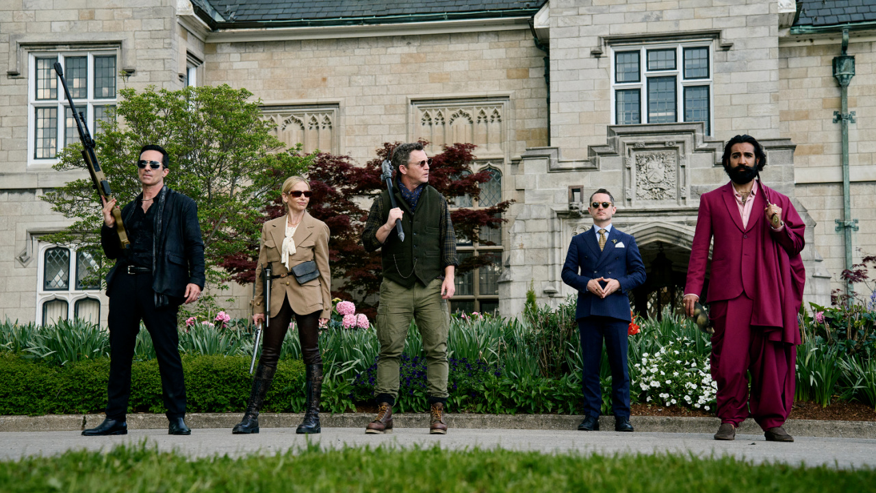 (L to R) Nestor Carbonell, Sarah Michelle Gellar, Shawn Hatosy, Elijah Wood, and Nadeem Umar-Khitab in 'Ready Or Not 2: Here I Come'. Photo by Searchlight Pictures/Pief Weyman, Courtesy of Searchlight Pictures. © 2026 Searchlight Pictures. All Rights Reserved.