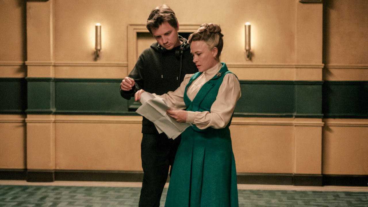 (L to R) Director Kirill Sokolov and Patricia Arquette as Lily Woodhouse in New Line Cinema/Nocturna’s 'They Will Kill You', a Warner Bros. Pictures release. Photo Credit: Graham Bartholomew. Copyright: © 2026 Warner Bros. Entertainment Inc. All Rights Reserved.